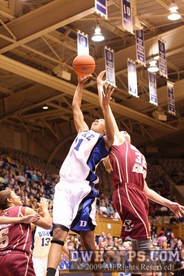Chante Black soars above Stefanie Murphy for a defensive rebound -  - 