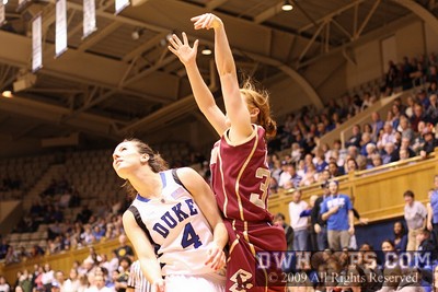Mickel Picco scores over Abby Waner, cutting the Duke lead to six again. -  - D4.O33;2, 2:20, 62-56