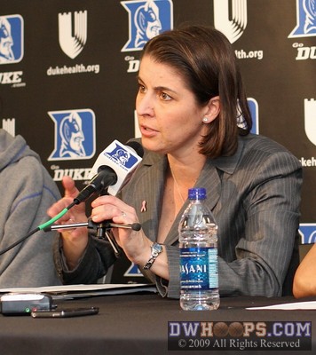 Coach McCallie in the interview room during her opening statement -  - 