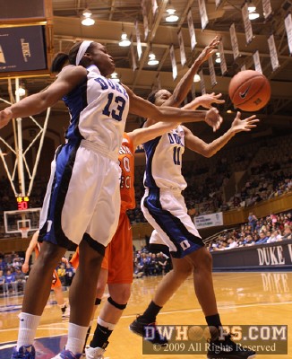 Christmas and Black vie for a rebound, ending up with the ball out to the Hokies -  - 