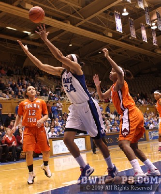 Krystal Thomas stretches for a wayward pass that became one of Duke's ten first half turnovers -  - 