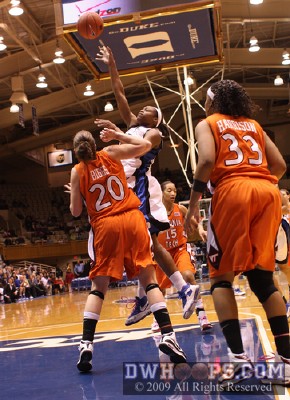 Karima Christmas throws up a shot from the paint -  - 