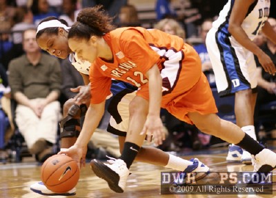 A near steal for Chelsea Hopkins after she poked the ball away from Nikki Davis -  - 