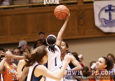 Chante Black looks on as Chelsea Hopkins deflects an eventual Blue Devil rebound -  - 