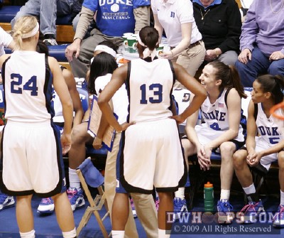 A happy moment on the bench during a media timeout -  - 