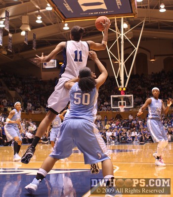 Chante Black soars high for an entry pass as Italee Lucas bodies up -  - D11.O50;1,10:18,18-15