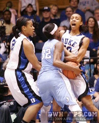Carrem Gay absorbs the impact of Rashanda McCants, getting the charge call (first of two) -  - D30.O32;1,7:56,23-16