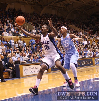 Bridgette Mitchell captures a long pass from Krystal Thomas. -  - D15.O32;1,3:42, 31-23