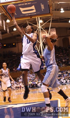 Iman McFarland fouls Chante Black in the act -  - D11.O21;2,18:55,42-32
