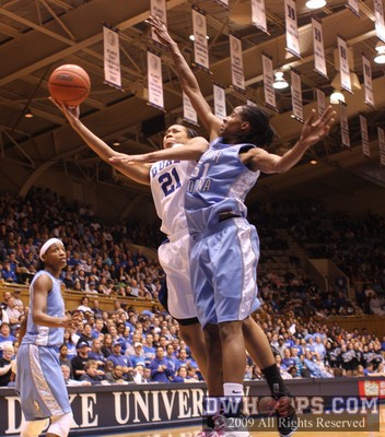 Joy Cheek subbed in for Chante Black, challenged Breland, and missed this shot -  - D21.O51;2, 16:34, 44-34