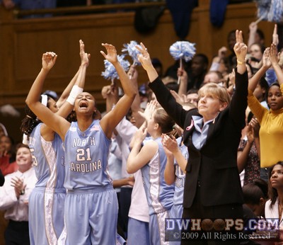 It's raining threes!  Carolina's bench celebrates back-to-back treys, the second coming from She'la White -  - O21.OC;2,11:19,50-48
