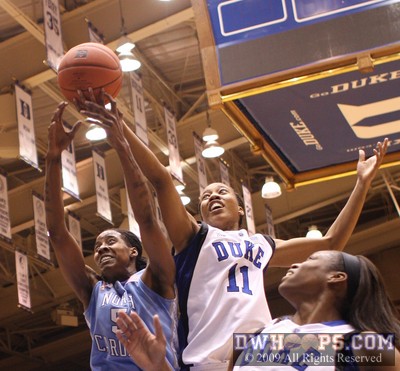 Chante Black fouls out of her senior night going over the back of Jessica Breland -  - O51.D11;2,4:13,61-63