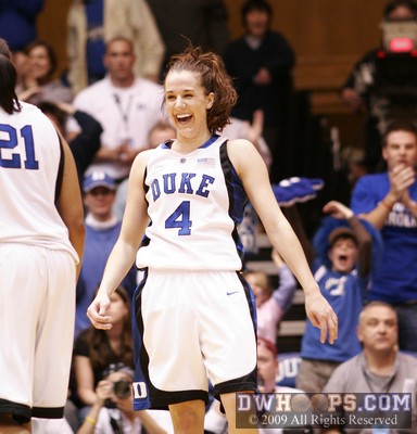 Abby Waner celebrates her enormous game-changing three pointer (first of two photos) -  - D4;OT, 0:46, 78-76