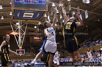 Abby Waner attempts a layup