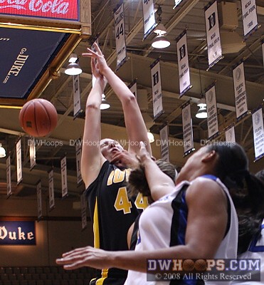 A stray hand rakes across Megan Skouby's face -  - O44;1, 16:07, 0-0