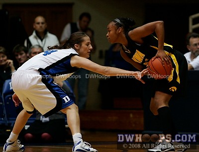 Abby Waner challenging Kachine Alexander - Abby's hustle plays provided a badly needed spark for the Blue Devils -  - D4.O21;