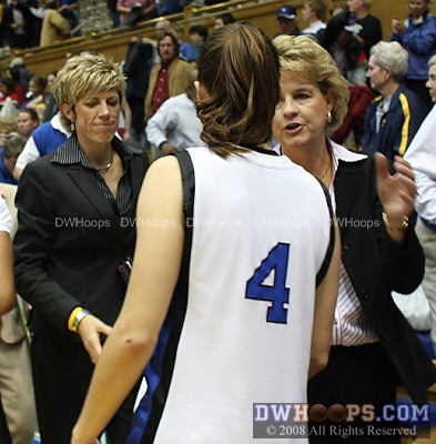 Abby Waner in the handshake line with Iowa's coaches -  - D4;