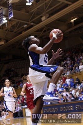 Karima Christmas goes to the basket for the score