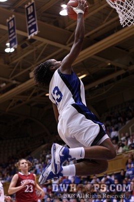 Karima Christmas goes to the basket for the score