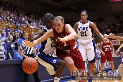 After she was stripped in a Duke trap, Jayne Appel lunges for the ball along with Bridgette Mitchell.  It would be one of Stanford's 23 turnovers. -  - D15.O2;
