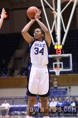 Krystal Thomas shows good form on a long jumper -  - D34;1,8:03,30-20