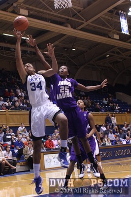 Krystal Thomas hits a layup from Jasmine Thomas for Duke's largest first-half lead -  - D34;1,6:16,36-20