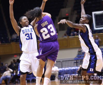 Keturah Jackson and Bridgette Mitchell gang up on Dawn Evans to force one of JMU's 11 first half turnovers -  - 