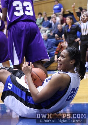 Joy Cheek on the floor after a held ball was called -  - 
