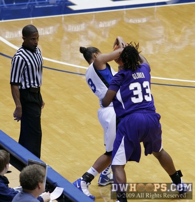 Shay Selby wrests the basketball from Nichelle Glover -  - 