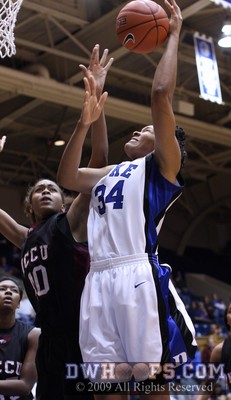 Krystal Thomas works to gather an offensive rebound -  - 
