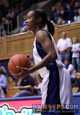 Chelsea Hopkins surveys the court before an inbounds pass -  - 