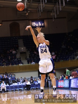 Kathleen Scheer hits a three -  - 