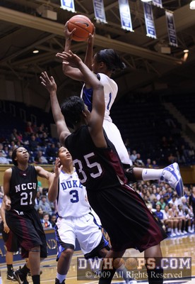 Chelsea Hopkins soars to gather in an offensive rebound -  - 