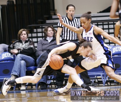 Chelsea Marandola drives into Jasmine Thomas -  - 