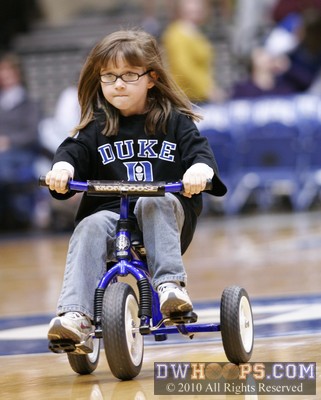 A determined tricycle rider goes for the win -  - 