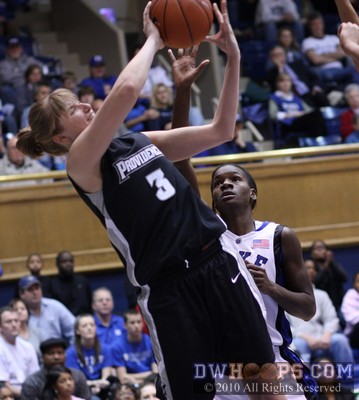 Chandler Mccabe twists past Bridgette Mitchell -  - 