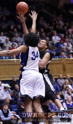Jessica Clark shoots over Krystal Thomas -  - 