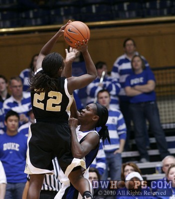 Bridgette Mitchell defends Lakevia Boykin's jumper -  - O22.D15;2,9:50,50-34