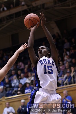 Bridgette Mitchell is fouled in the act by Sandra Garcia - her fifth -  - D15;2, 4:26, 57-41