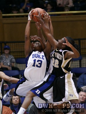Karima Christmas, Joy Cheek, and Wake's Lakevia Boykin battle for one of the last rebounds of a very physical contest -  - 
