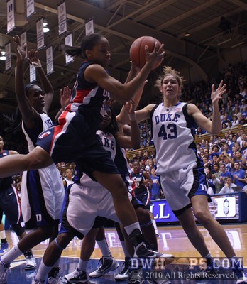 Lorin Dixon pulls down a defensive rebound for the Huskies -  - 