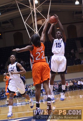 Bridgette Mitchell shoots over Porscia Hadley -  - 