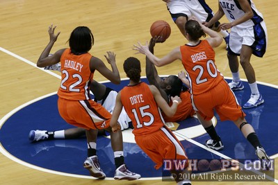 Bridgette Mitchell in the middle of a center court pile up -  - 