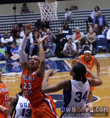 Brittany Gordon working hard under the basket -  - 