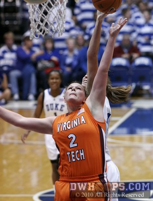 Abby Redick stretches for a rebound -  - 