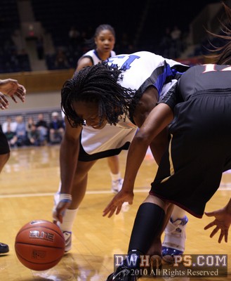Karima Christmas dives for a loose ball -  - 