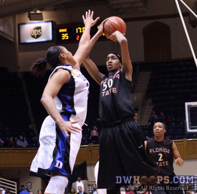 Jacinta Monroe tries for back-to-back hoops, but Joy Cheek helps her miss -  - D21,O50;2,17:06,35-17