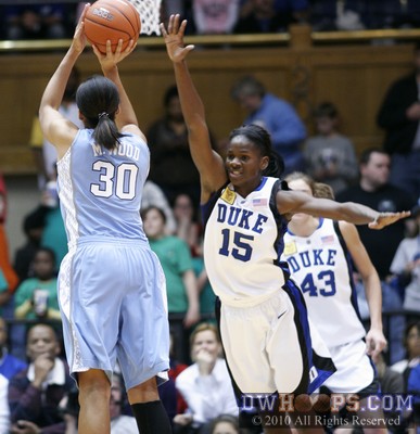Martina Wood tries a three over Bridgette Mitchell -  - 