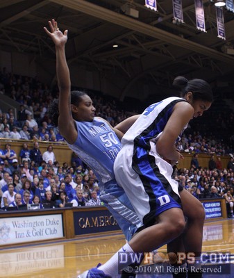 Krystal Thomas draws a foul from Italee Lucas -  - 