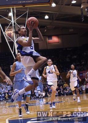 Jasmine Thomas soaring to the basket -  - 